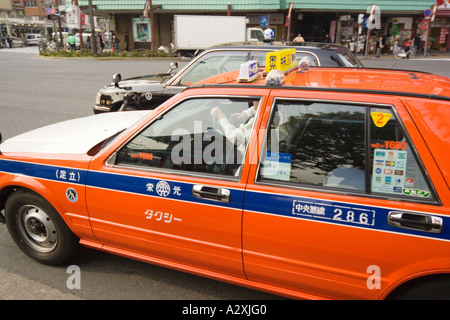 Asakusa Tokyo Japan Taxi Red orange Stock Photo