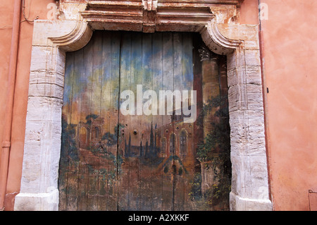 FRANCE Colorful painted door City of Rousillion Provence Stock Photo