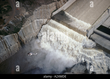 Aerial view of the spillway of the Itaipu dam on the Paraguay Brazil border as water flows down the spillway for the first time. Stock Photo