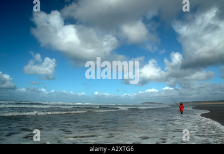 Surf Fishing for Bass Llangennith Beach Gower Peninsula South Wales Stock Photo