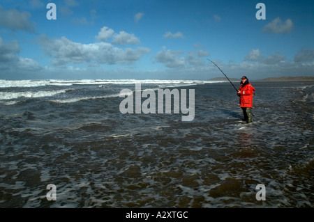 Surf Fishing for Bass Llangennith Beach Gower Peninsula South Wales Stock Photo