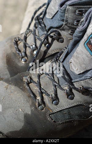 Walking boots wet and dirty Stock Photo