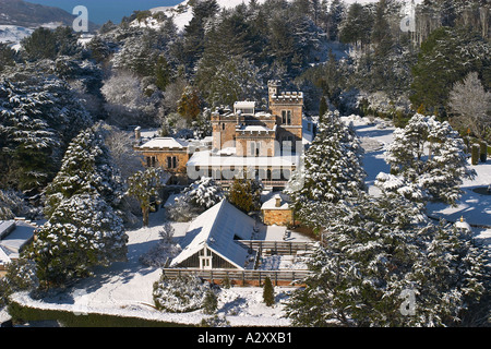 Larnach Castle and snow Otago Peninsula Dunedin South Island New Zealand aerial Stock Photo