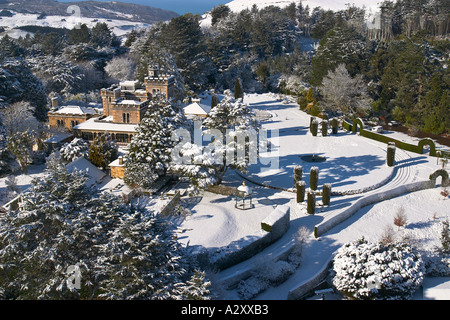 Larnach Castle and snow Otago Peninsula Dunedin South Island New Zealand aerial Stock Photo