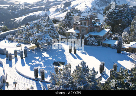 Larnach Castle and snow Otago Peninsula Dunedin South Island New Zealand aerial Stock Photo