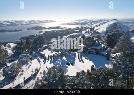 Larnach Castle and snow Otago Peninsula Dunedin South Island New Zealand aerial Stock Photo