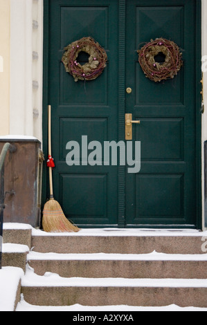 Traditional Christmas wreath decorations, hanging on the doors of a house in Oslo, Norway Stock Photo