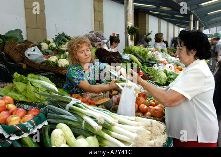 Local women buying fruit and vegetables at the market, San Sebastian, Spain Stock Photo