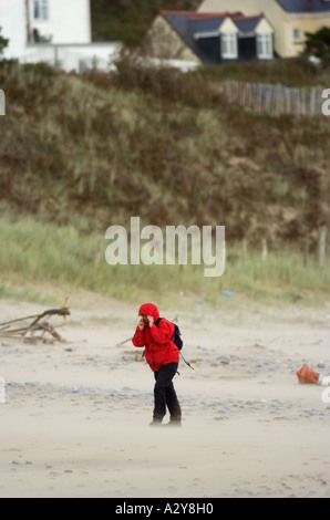 Walking in Gale Horton Beach Gower Peninsular South Wales Stock Photo