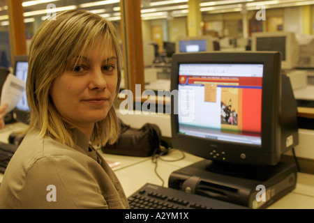 Close-up of female mature Student using computer in  college GB UK Stock Photo