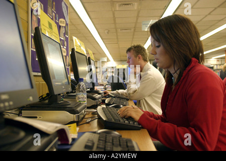 Female and male Students using computers in sixth form college  GB UK Stock Photo