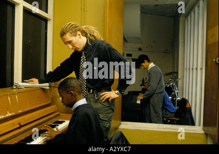 hackney downs school set to be closed by government in 1995 due to poor performance conditions music lesson 1994 Stock Photo