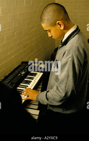 hackney downs school set to be closed by government in 1995 due to poor performance conditions music lesson 1994 Stock Photo