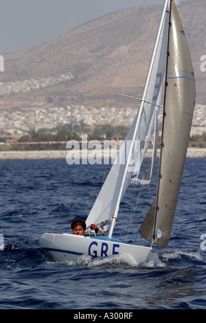 Stamatis Kalligeris of Greece competes in race 3 of the Mixed 2 4mR open category during the Athens 2004 Paralympic Games Stock Photo