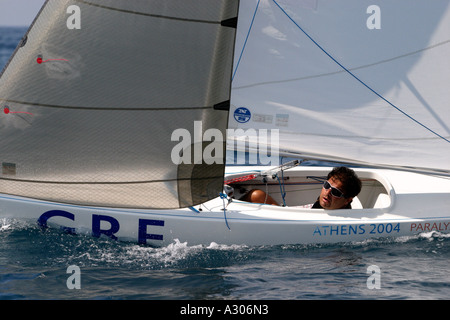 Stamatis Kalligeris of Greece competes in race 7 of the Mixed 2 4mR open category during the Athens 2004 Paralympic Games