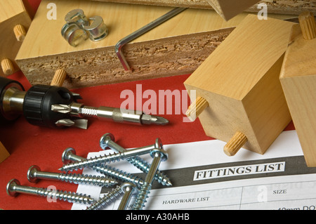 Flat pack furniture fittings and tools with parts list Stock Photo