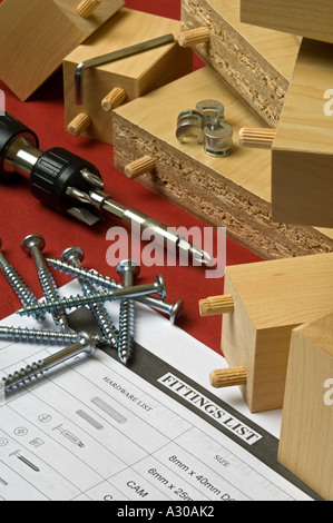 Flat pack furniture fittings and tools with parts list Stock Photo