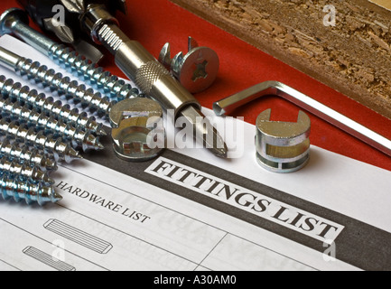 Flat pack furniture fittings and tools with parts list Stock Photo