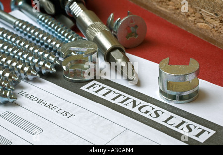 Flat pack furniture fittings and tools with parts list Stock Photo