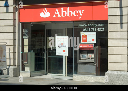 Typical shop front branch premises of the Abbey Santander bank with automated cash machine Stock Photo