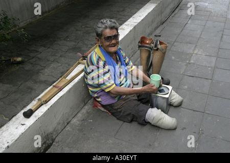 Disabled Street Beggar in Bangkok Thailand Stock Photo