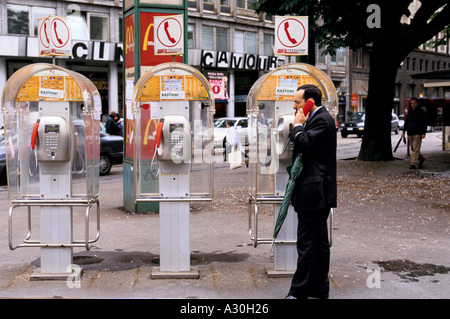 Man speaking on a telephone in centre of  Milan Stock Photo