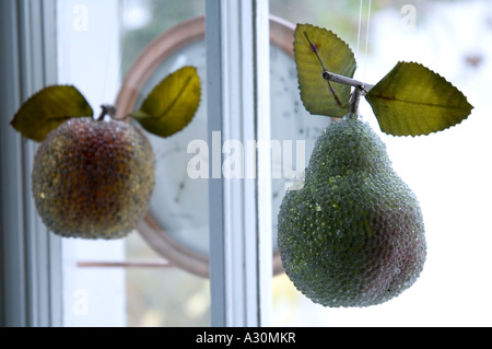 Crystal fruit Christmas decoration hanging in the window Stock Photo