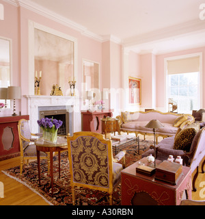 View of a pink living room in an english country house Stock Photo