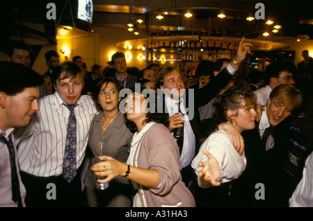 business people drinking at a bar after work Stock Photo