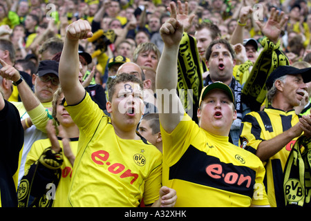 Fans of Borussia Dortmund football club at a stadium, Germany Stock Photo