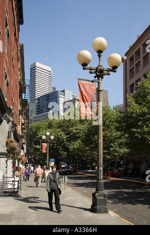 Person walking through downtown Seattle near Pioneer Square USA Stock Photo