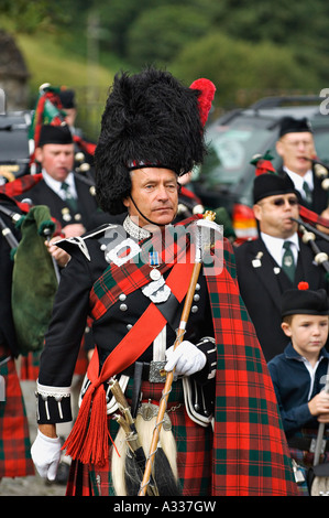 Drum Major Leading the Alloa Bowmar Bagpipe Band Killin Scotland Stock Photo