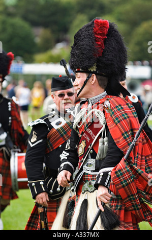 Drum Major Leading Inverness Royal British Legion Pipe Band at the Close of the Glenurquhart Highland Gathering and Games Drumna Stock Photo