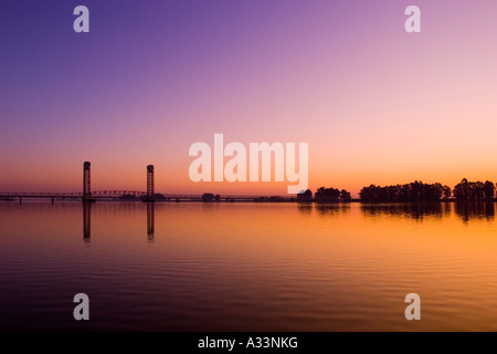 The Rio Vista Bridge over the Sacramento River, at sunrise. Northern ...