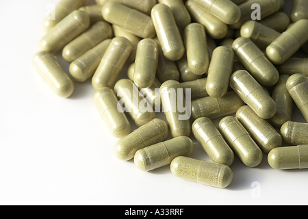 pile of capsules on white Stock Photo