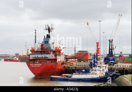 Cargo ships unloading at container dock facilities at the port of Foynes on the River Shannon estuary, County Limerick, Ireland Stock Photo