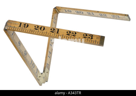 Folding wood measuring ruler Brass hinges Letter F Stock Photo