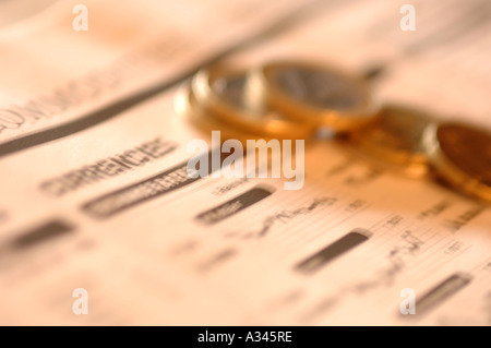 euro coins on top of the newspaper Stock Photo