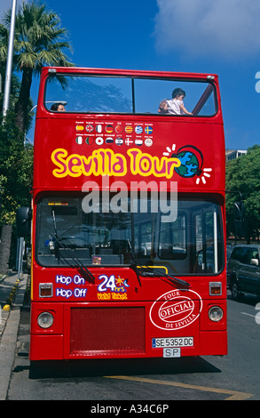 Tour of Seville Sevilla bus open top with tourists aboard ...