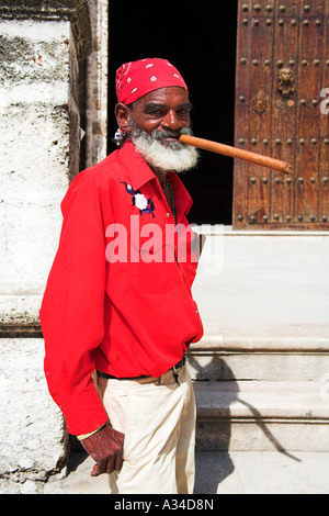 Old man with a long cigar in his mouth, Plaza de la Catedral, Havana, La Habana Vieja, Cuba Stock Photo