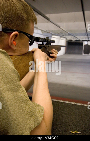 American indoor gun shooting range Male shooter at target practice Las Vegas Nevada Shooting gallery Stock Photo