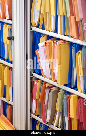 Royalty free photograph of filling cabinet with lots of records and accounts in business office London UK Stock Photo