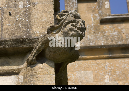 Weathered gargoyle affected by acid rain St Peters Church Winchcombe UK Stock Photo