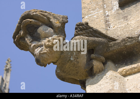 Weathered gargoyle affected by acid rain St Peters Church Winchcombe UK Stock Photo