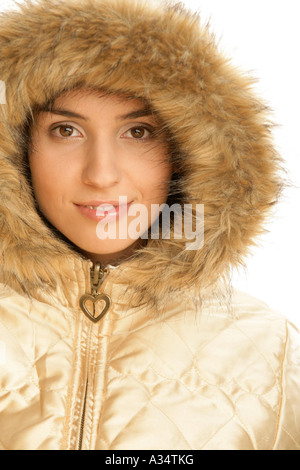 Portrait of woman wearing fur hood Stock Photo