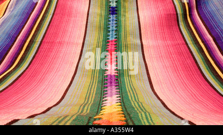 Detail of brightly coloured woven shawls zut from Chichicastenango Guatemala Stock Photo