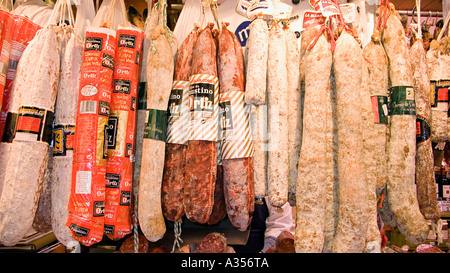 Detail of Spanish chorizos hanging outside a food stall at Mercat de la Boqueria Boqueria Market La Rambla Barcelona Spain Stock Photo