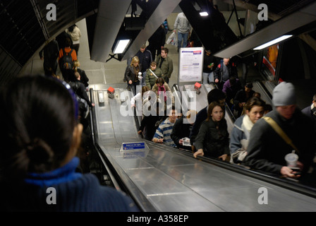 Travellers on a crowded escalator on the London underground Stock Photo