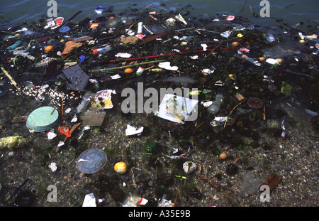 Plastic and rubbish polluted seashore near Athens Greece 1990's Stock Photo