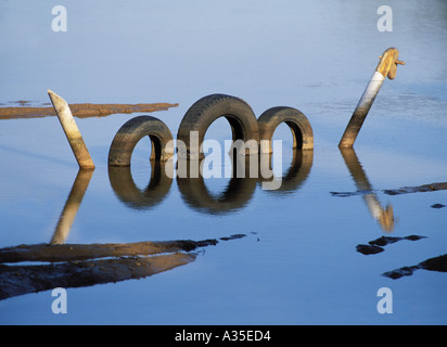 Loch Ness Monster. Joke made from old tyres and a rocking horse head. Stock Photo